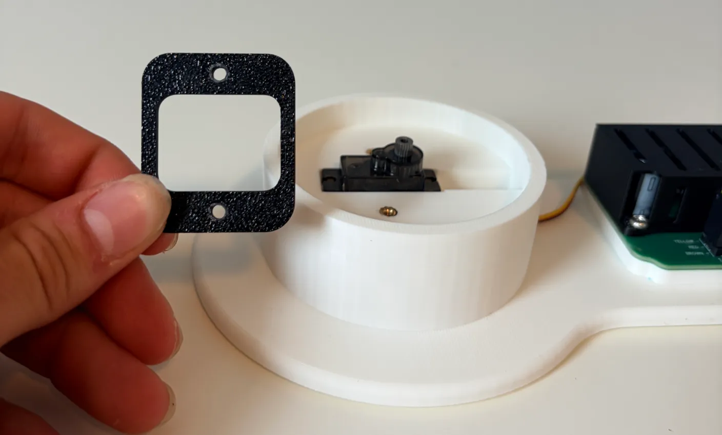 Robotic Arm build — Start with the Base: Grab this black piece.