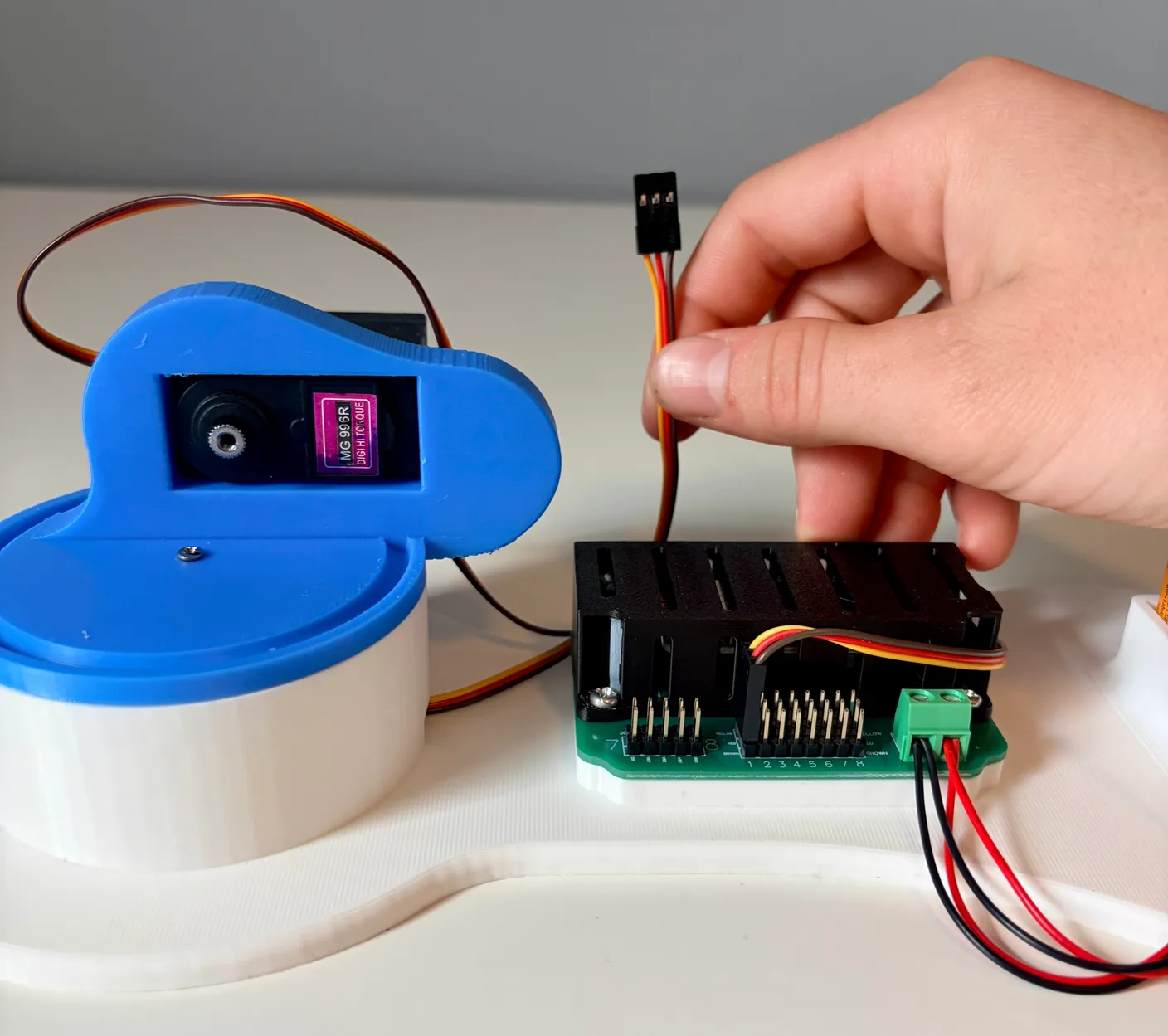 Robotic Arm build — Assemble the First Half of the Arm: Now connect this motor to the circuit board.