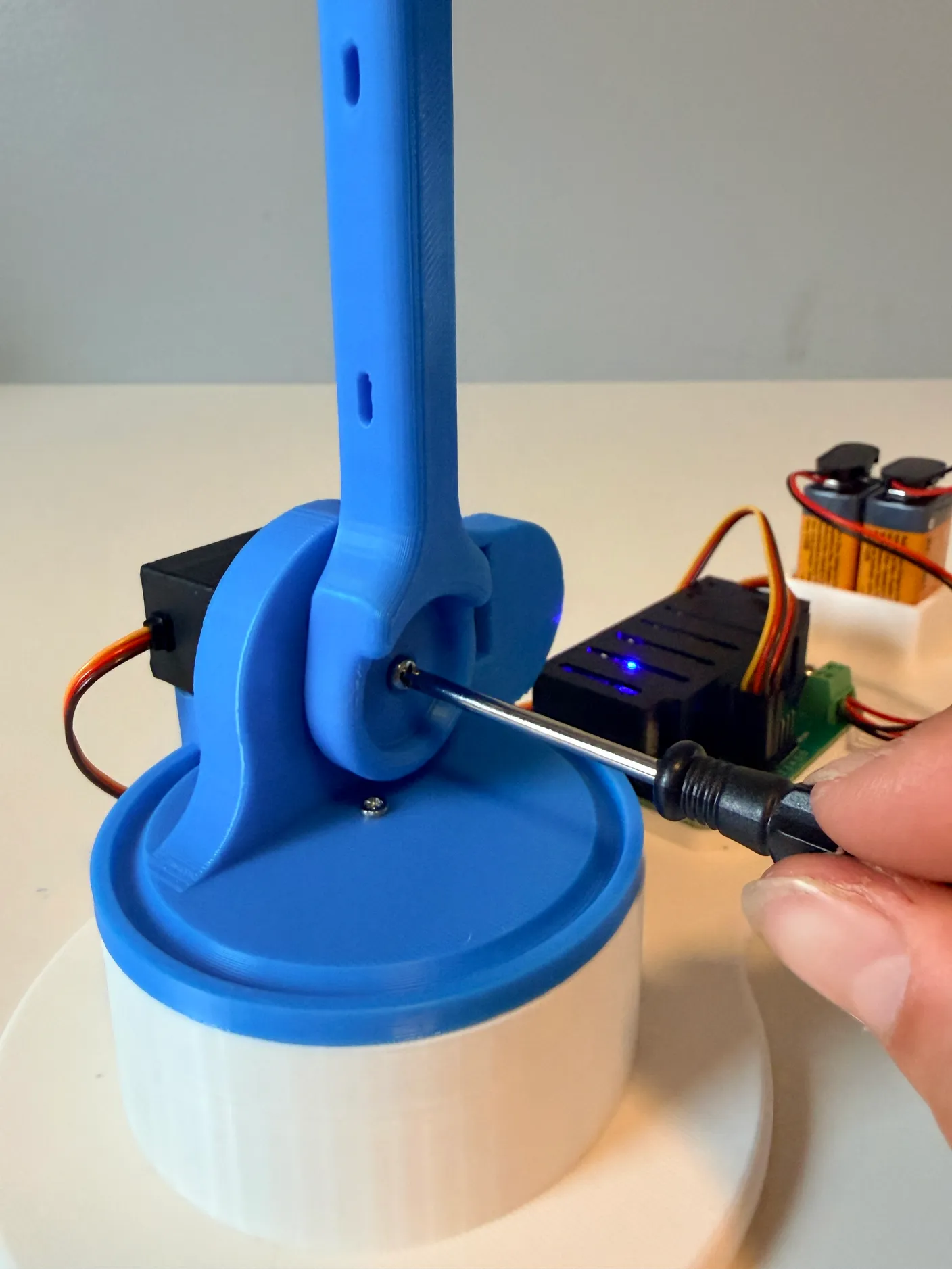 Robotic Arm build — Assemble the First Half of the Arm: Screw the arm in tight with a 6mm screw — this one supports the whole arm.