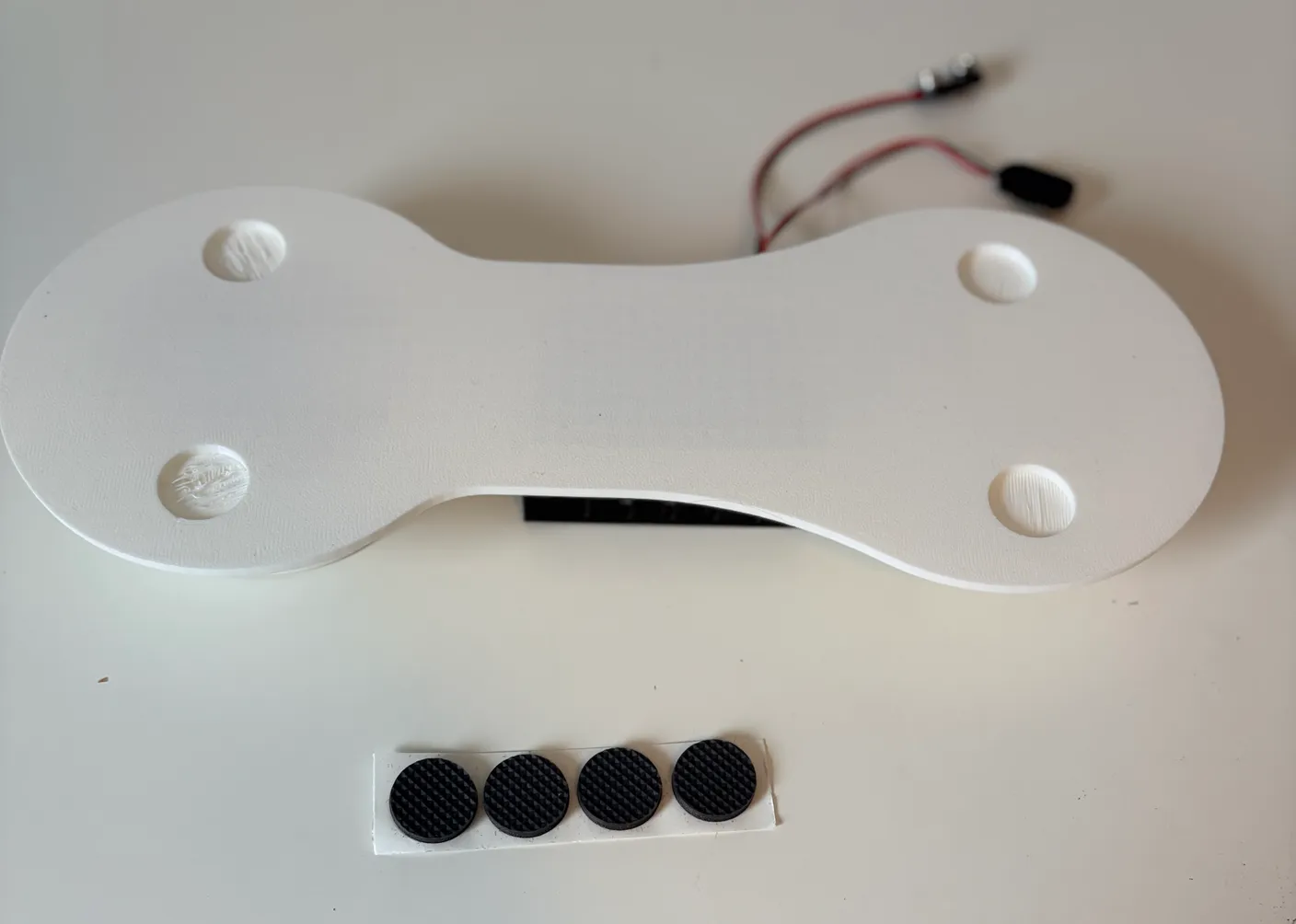 Robotic Arm build — Start with the Base: Get the four rubber adhesive pads ready.
