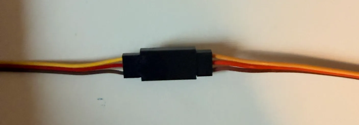 Robotic Arm build — Assemble the Other Half of the Arm: Connect the wire extender to the servo wire, matching the colors.