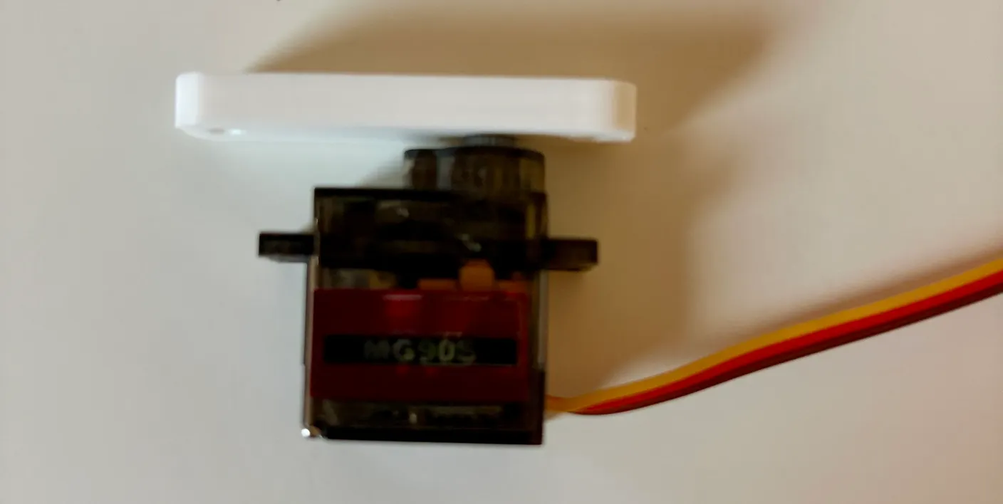Robotic Arm build — Assemble the Other Half of the Arm: Flip the piece up and attach it to the servo.