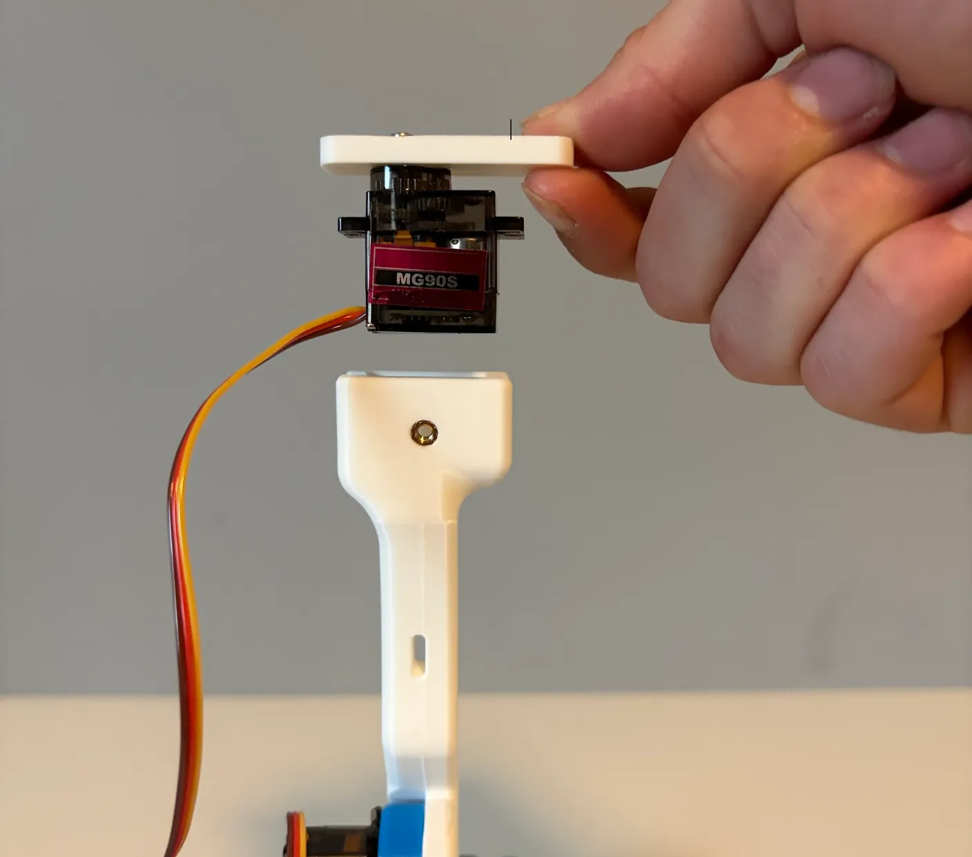 Robotic Arm build — Assemble the Other Half of the Arm: Orient the servo as shown above.
