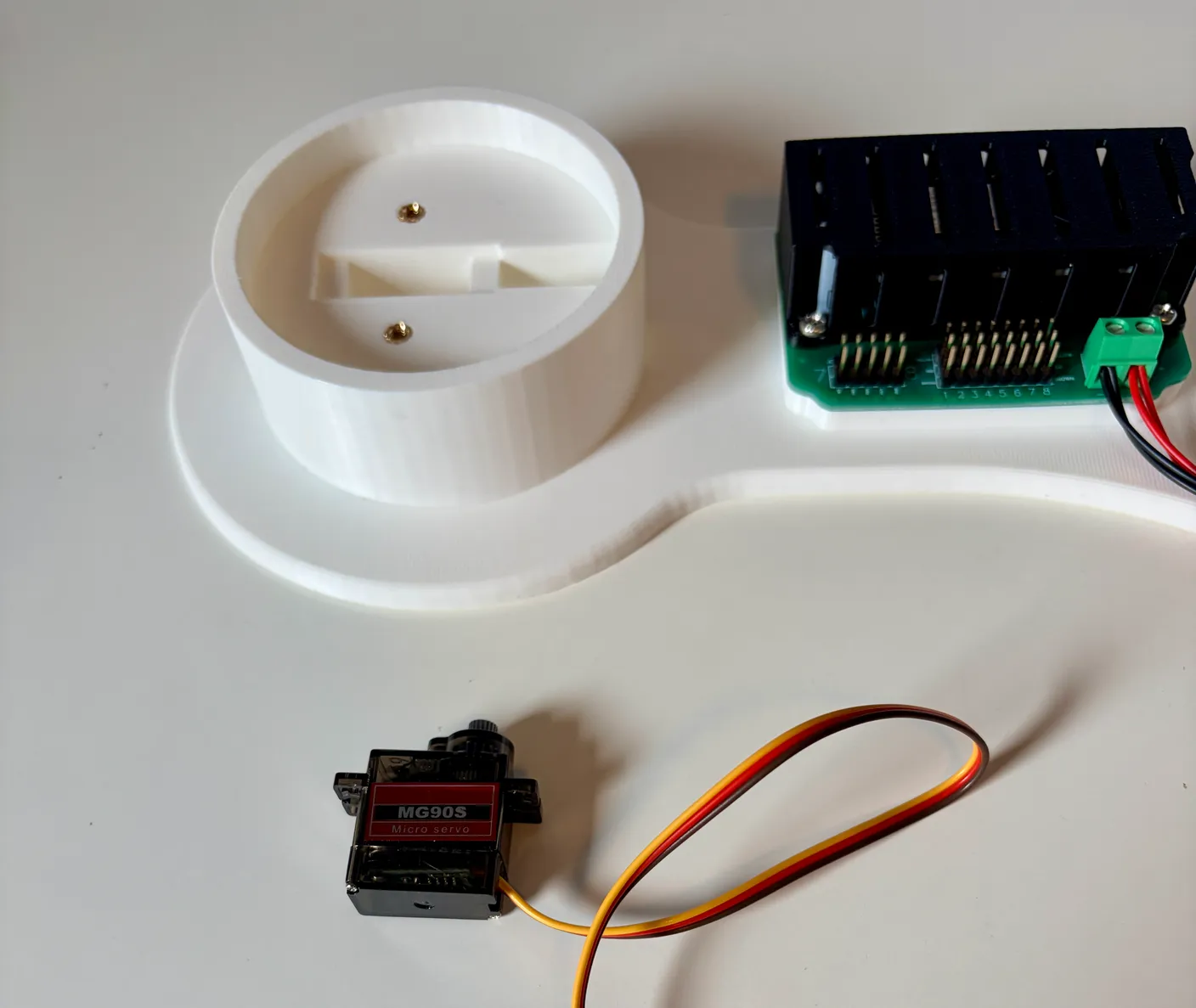 Robotic Arm build — Start with the Base: Get your first servo ready — one of the smaller ones.