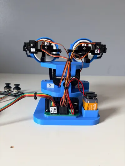 Robotic Eyes Kit rear view showing the control board and wiring harness