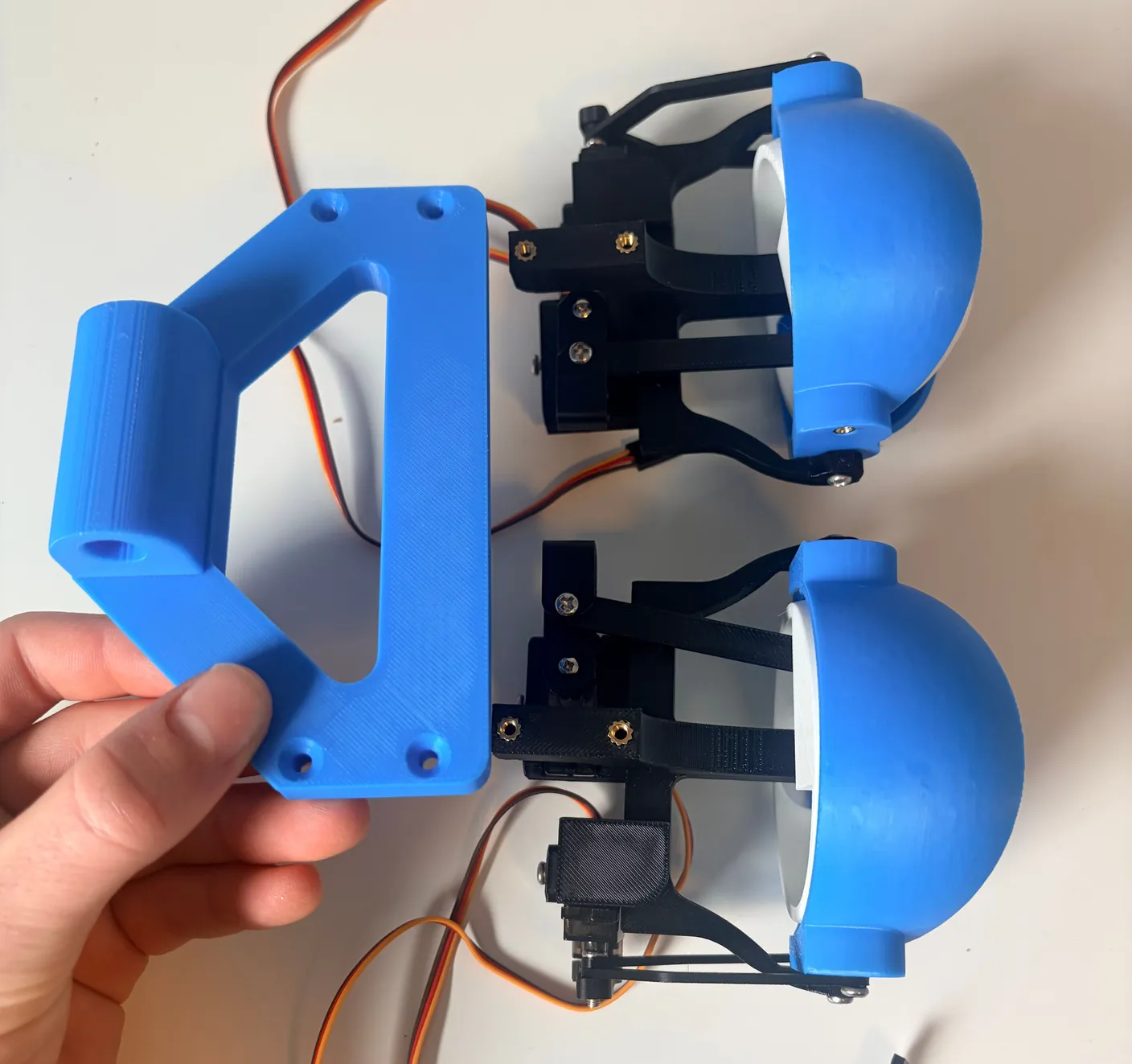 Robotic Eyes build — Assemble the Neck: Flip the eyes upside down and arrange them exactly as the image shows below.