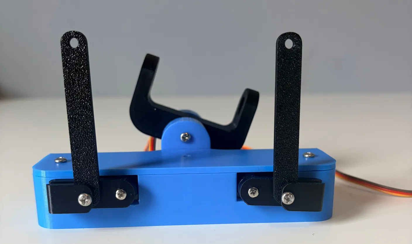 Robotic Eyes build — Assemble the Neck: Then, use two 10mm screws to secure them in place.