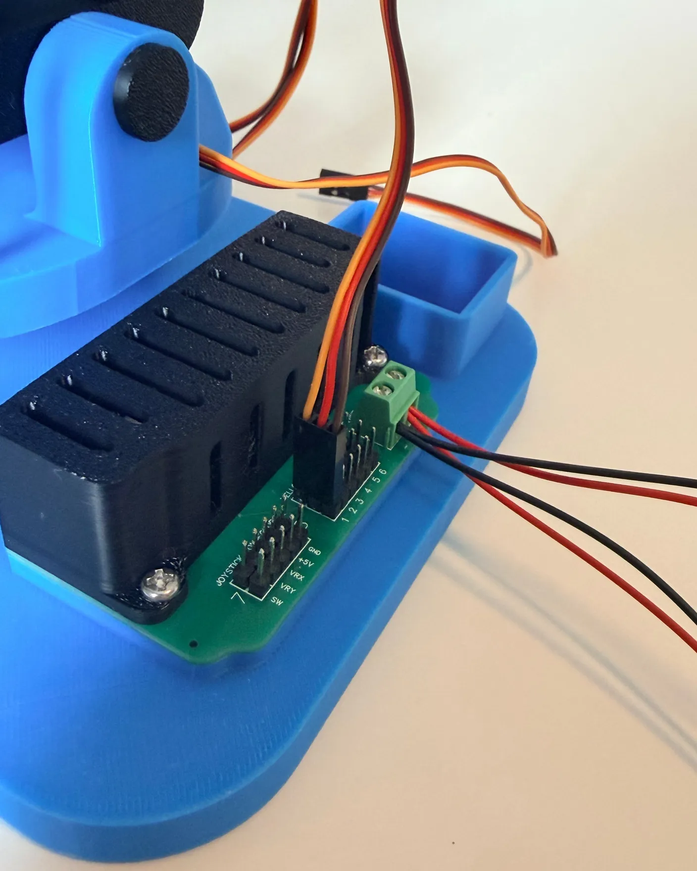 Robotic Eyes build — Wire it up: Now, start connecting the wires from each motor to their respective spots.