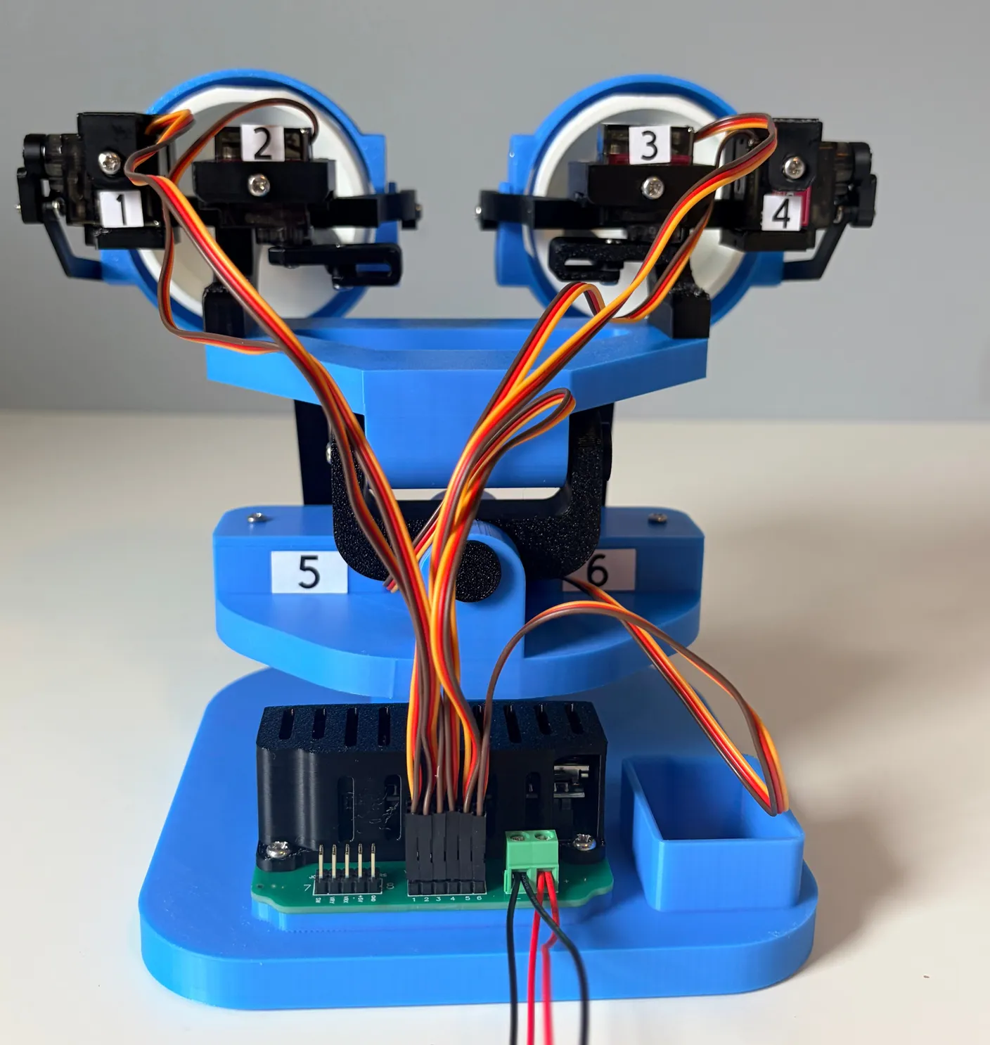 Robotic Eyes build — Wire it up: Now, wire all of the motors to the circuit board.