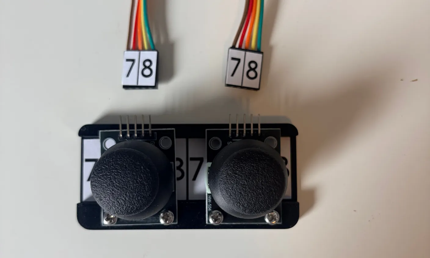 Robotic Eyes build — Wire it up: Grab the two long wires.
