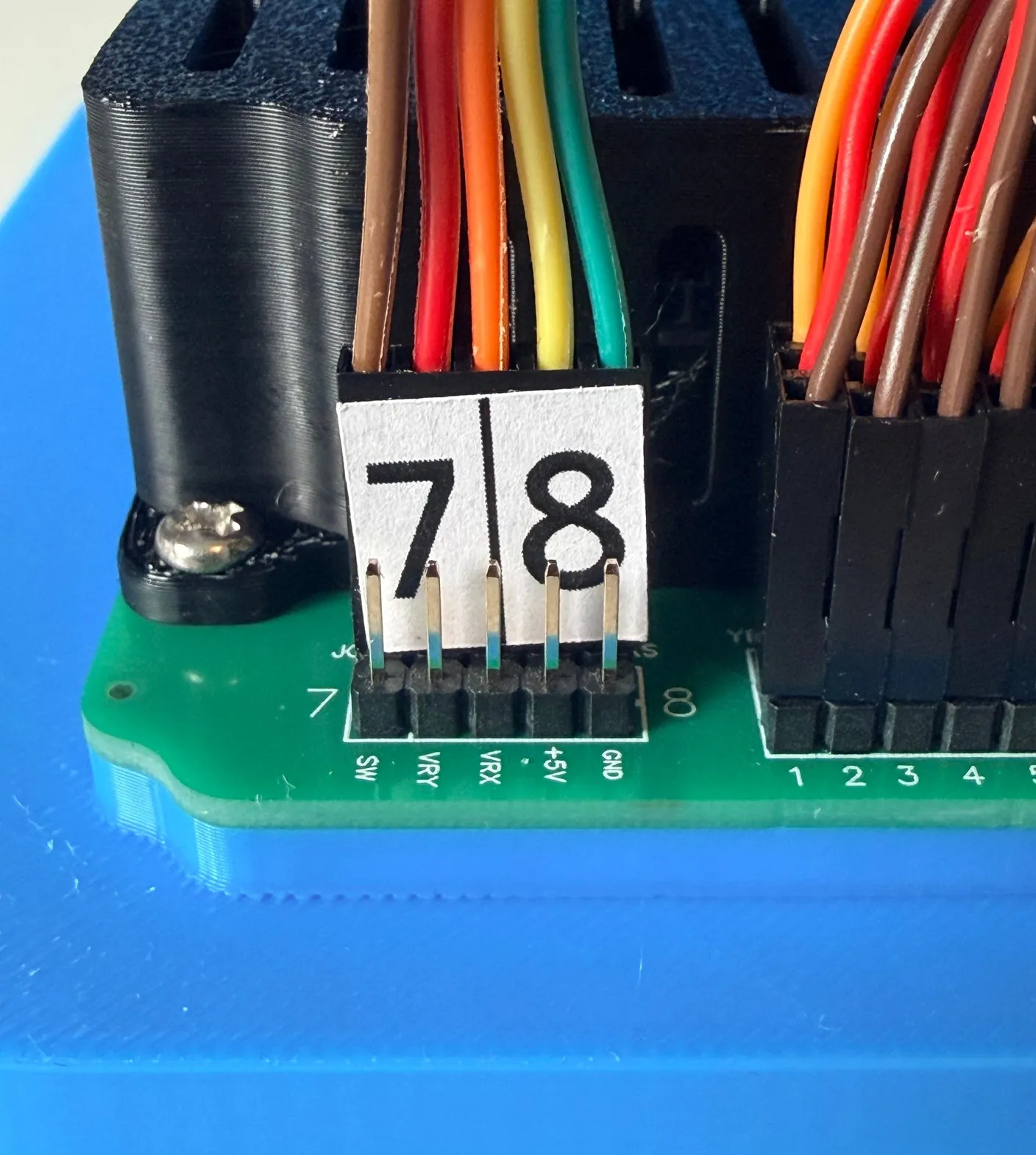 Robotic Eyes build — Wire it up: Now we need to plug the other end of the wire into the circuit board.