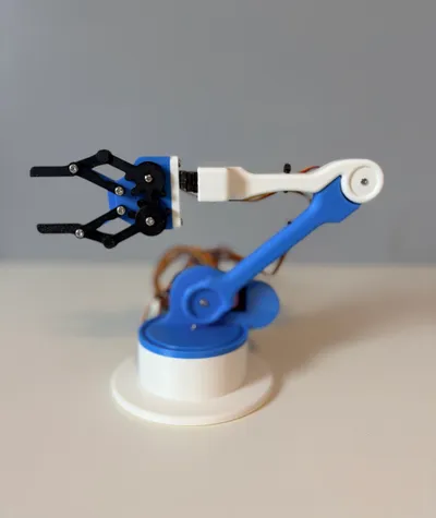 Robotic Arm Kit extended and reaching, showing the full arm from base to gripper