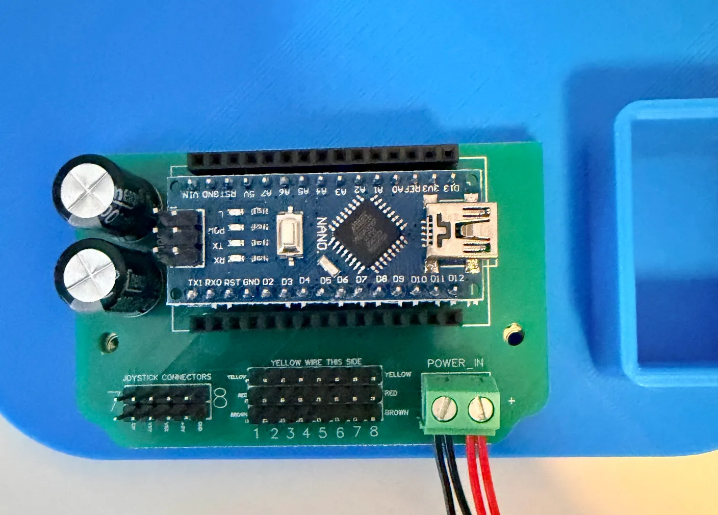 Robotic Eyes build — Swap from Joystick to Wireless: The control board lifted out, with the Arduino Nano seated on it.